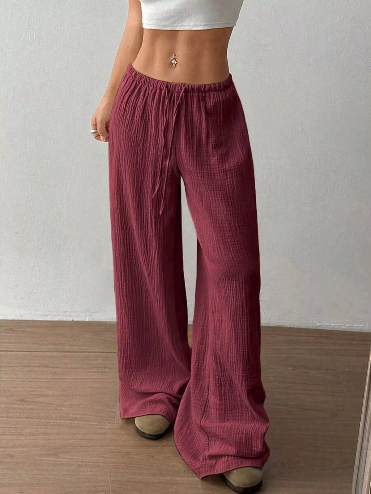 Plush Fashion Hub wide-leg drawstring pants in soft fabric with a relaxed fit and casual style, shown on a model.