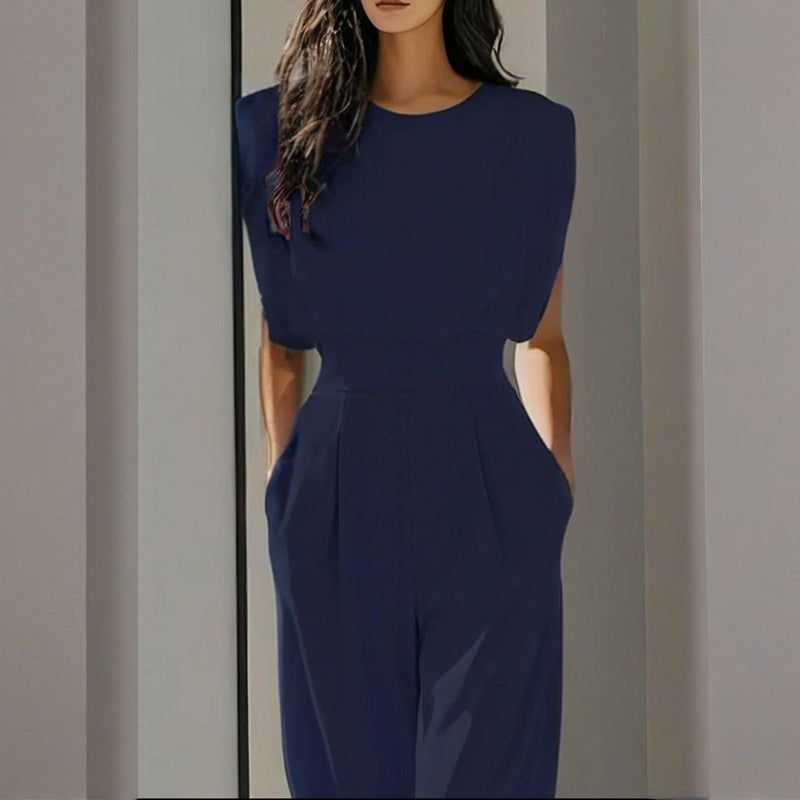 Women’s wide-leg short sleeve jumpsuit by FitiqueFit featuring a casual design, lightweight fabric, and relaxed fit.