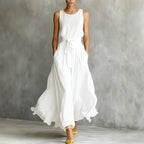 Women's sleeveless lace-up waist-cinching maxi dress by FitiqueFit featuring a flowy silhouette and elegant design.