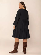 Plus size button front balloon sleeve dress by Shopimist, featuring a flattering fit with stylish balloon sleeves and a button-down front.