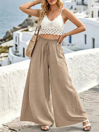 Plush Fashion Hub wide leg drawstring pants in soft fabric, featuring a relaxed fit and adjustable waistband.