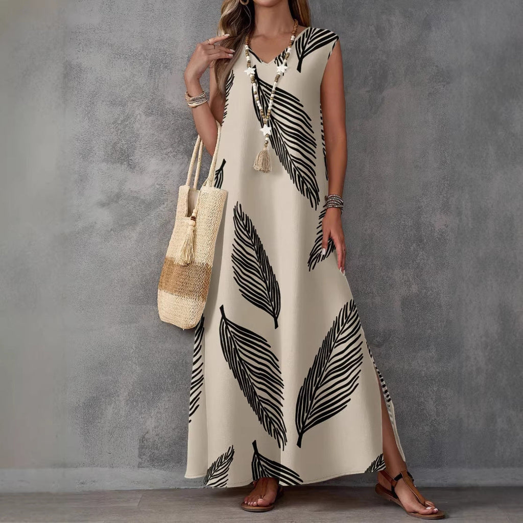 Printed V-neck sleeveless high-waist maxi dress by FitiqueFit in three colors, featuring a flowy design and elegant silhouette.