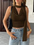 Satin-feel sleeveless cami top with cowl neck and ruched details, versatile blouse in a stylish, elegant design.