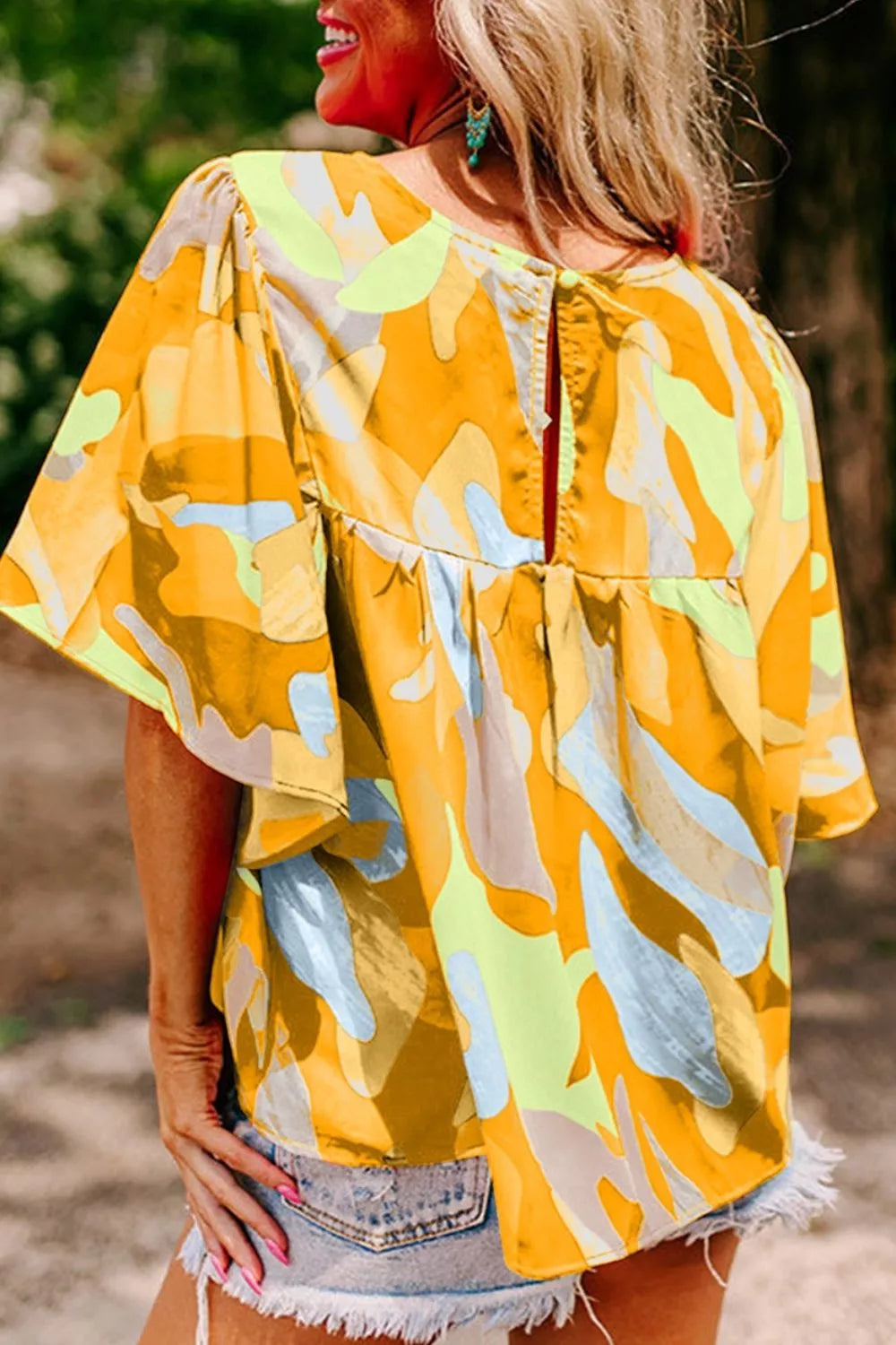 Multicolour abstract pattern wide sleeve crew neck blouse by Plush Fashion Hub, featuring vibrant design and comfortable fit.