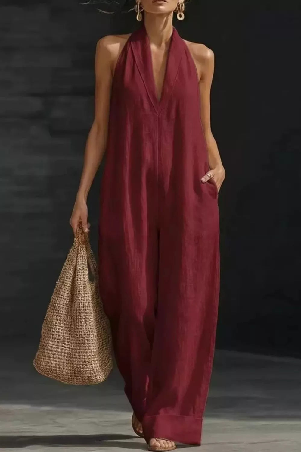 Women's sleeveless wide-leg jumpsuit with pockets, casual chic romper by Trendsi, shown in a stylish, comfortable fit.