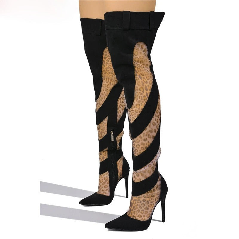 Black suede thigh-high stiletto boots with a leopard-print mesh pattern, pointed toes, and diagonal straps.