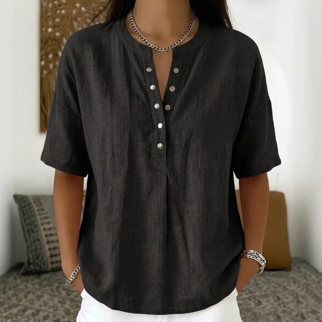 Women's loose-fit short-sleeve pullover top in solid color from Plush Fashion Hub, casualwear style, shown on a model.