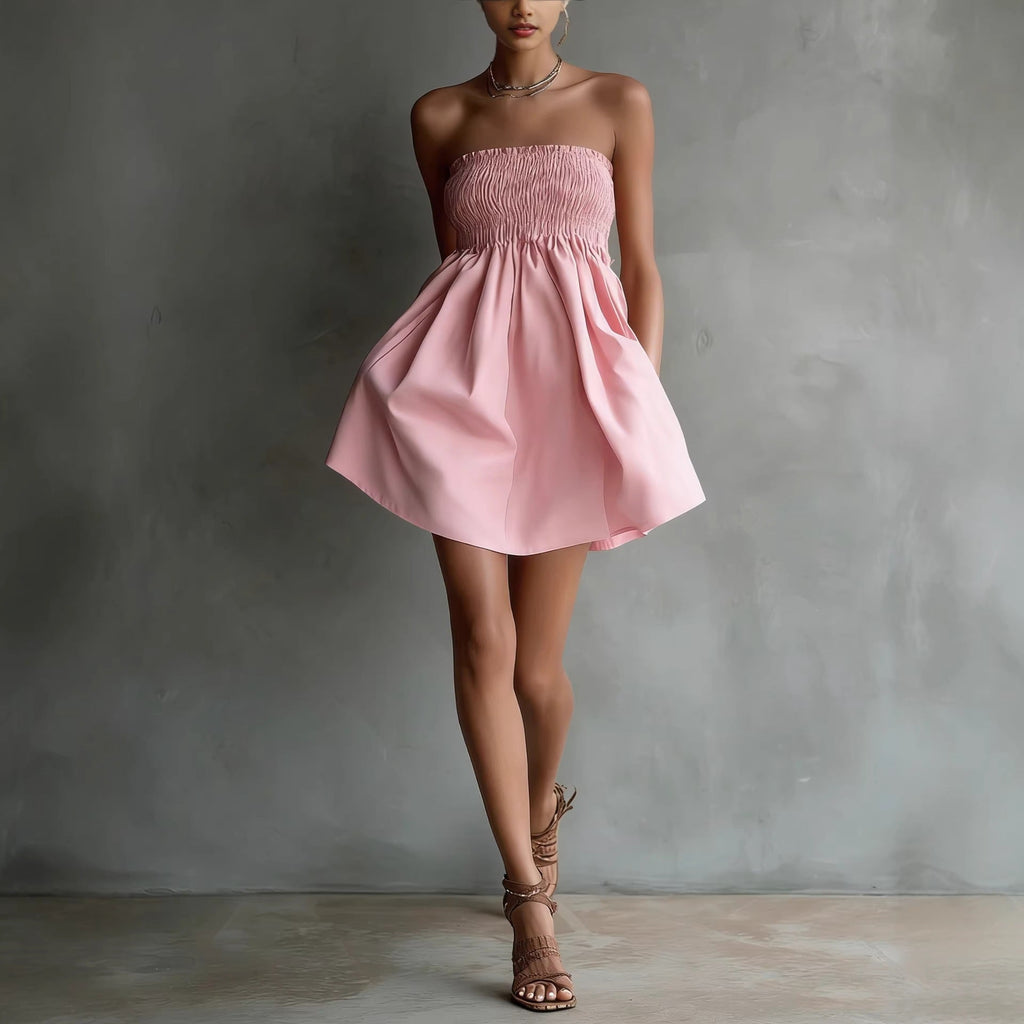 Women's strapless tube mini dress by FitiqueFit featuring a solid color and elastic waist, perfect for casual wear.