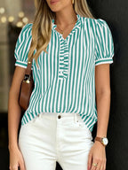 Women's striped puff sleeve blouse with ruffled details, stylish and feminine fashion top from Trendsi.