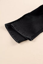 High-waisted button-fly wide-leg jeans by Trendsi, showing denim fabric, button closure, and relaxed wide-leg fit.