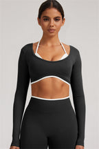 Fitglutes Activewear long sleeve crop top and leggings 2-piece set, high-waist sportswear for workout and gym activities.