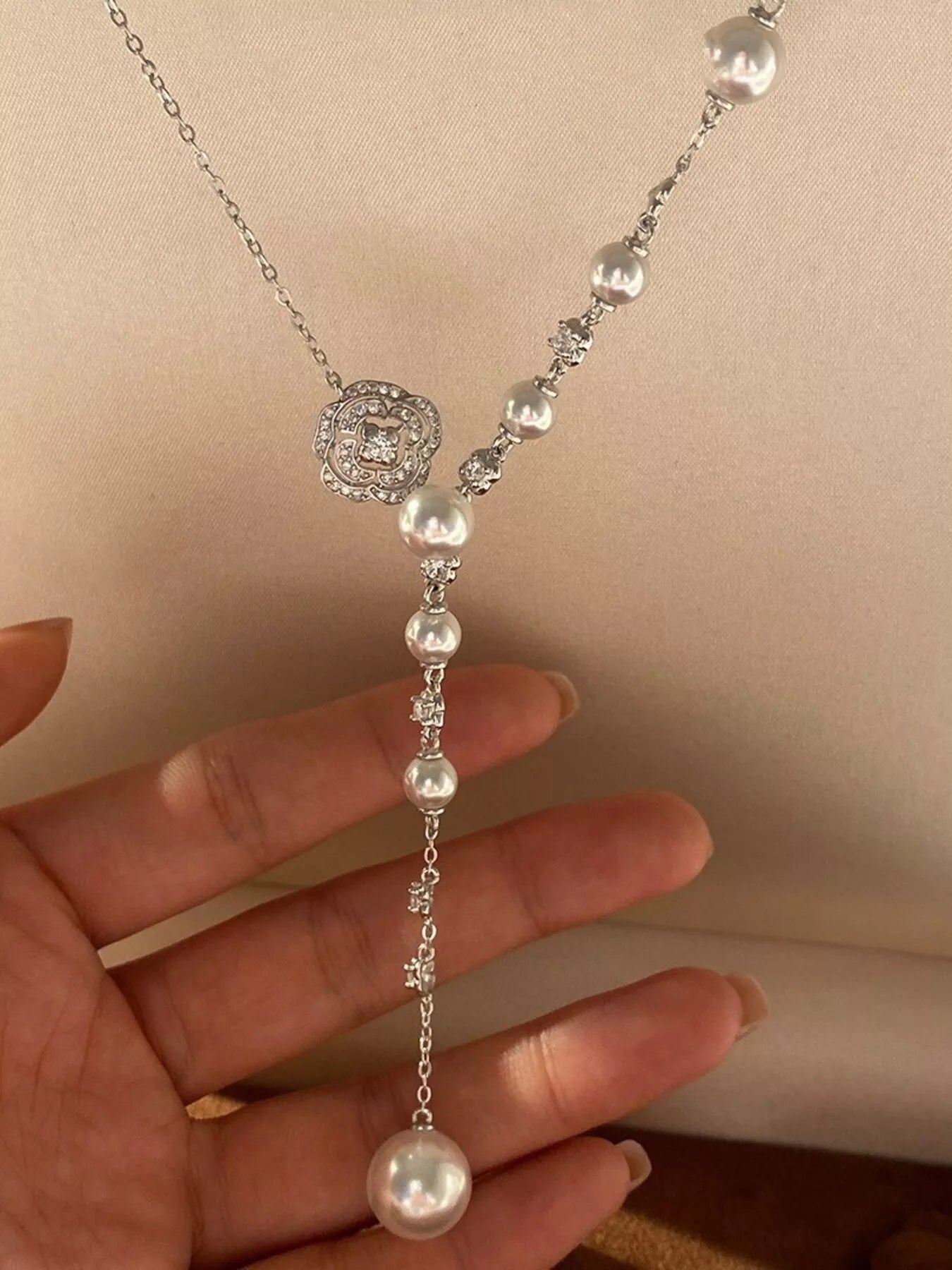 Pearl flower Y-necklace by Shopimist featuring delicate pearl flowers on a elegant Y-shaped chain.
