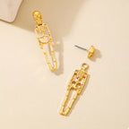 Halloween 18K gold-plated skeleton earrings with detailed bone design, perfect for spooky seasonal fashion.
