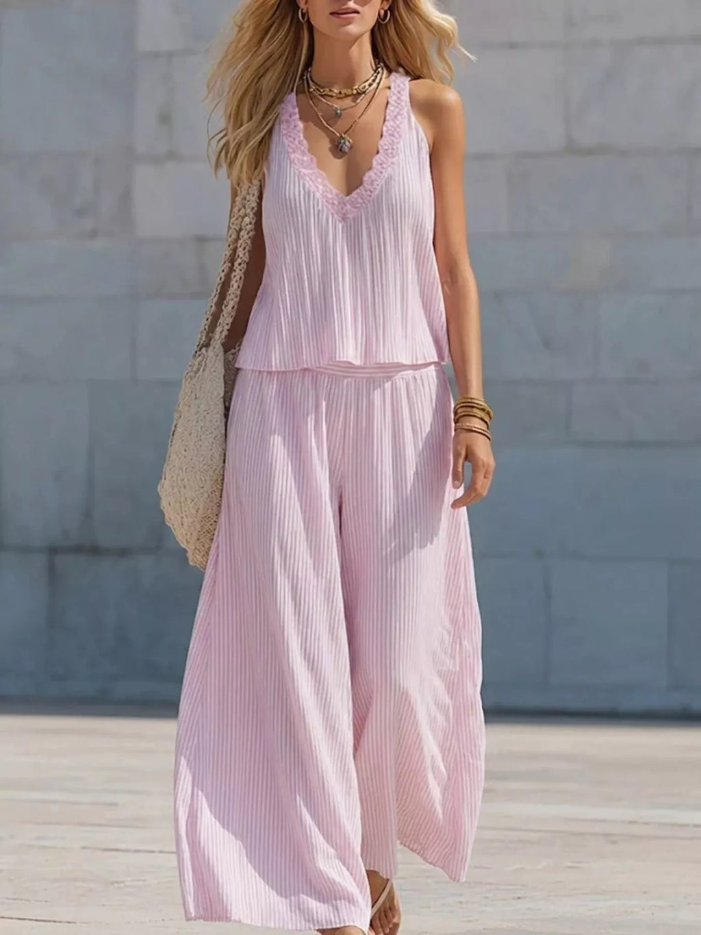 Striped V-neck tank top and wide-leg pants set by Shopimist, featuring a stylish two-piece outfit with bold stripe pattern.