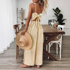 Ginger yellow printed backless sleeveless strap jumpsuit from FitiqueFit, featuring a relaxed fit and stylish design.
