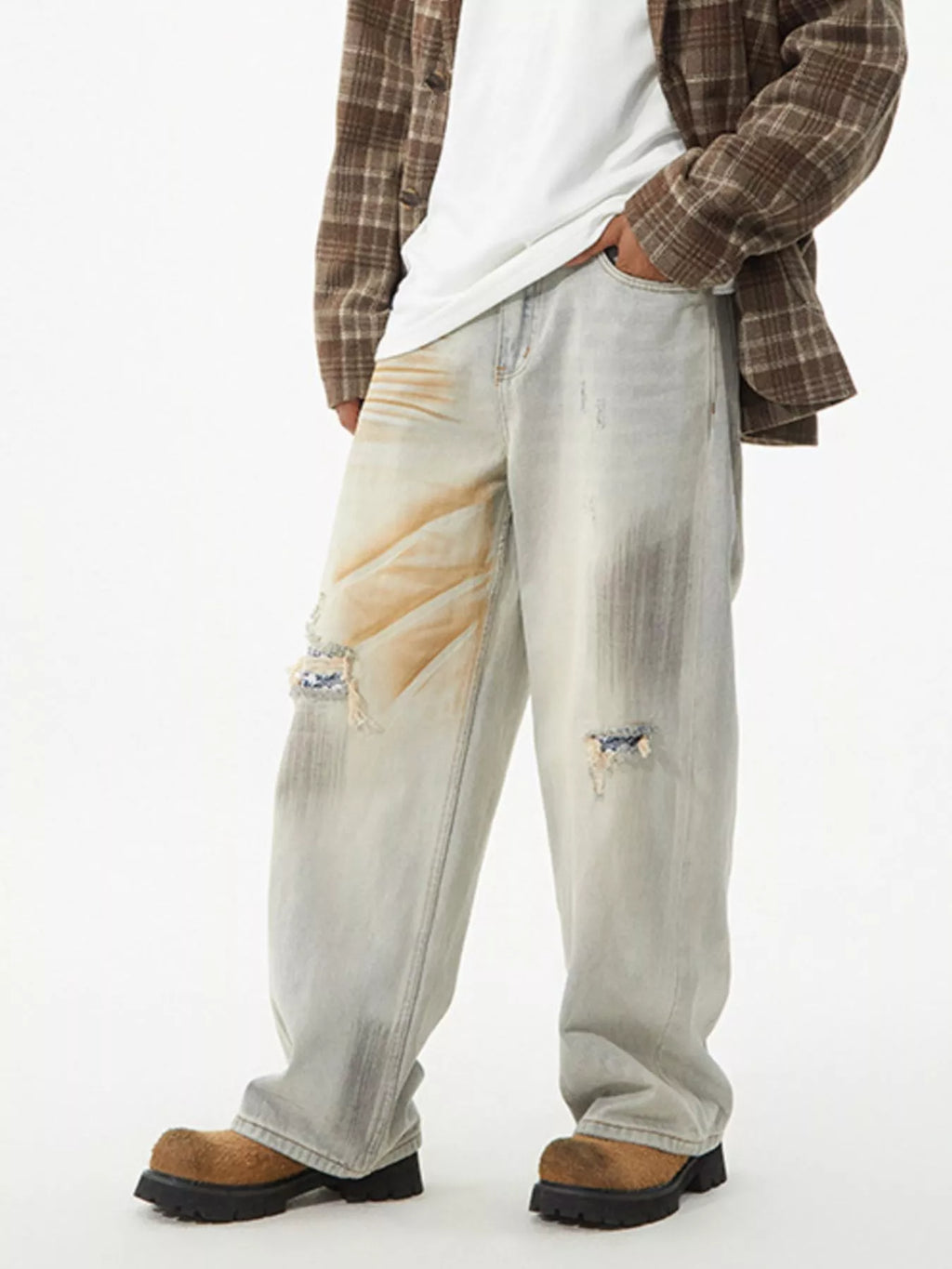Men's distressed wide leg jeans by Trendsi featuring a relaxed fit, ripped details, and casual style in denim.