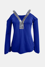 Sequin V-neck cold shoulder top from Trendsi, featuring shimmering sequins and a stylish V-neck with cold shoulder cutouts.