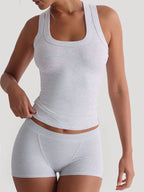 Ribbed tank top and shorts active wear set by Trendsi, featuring a comfortable ribbed fabric in a stylish matching design.