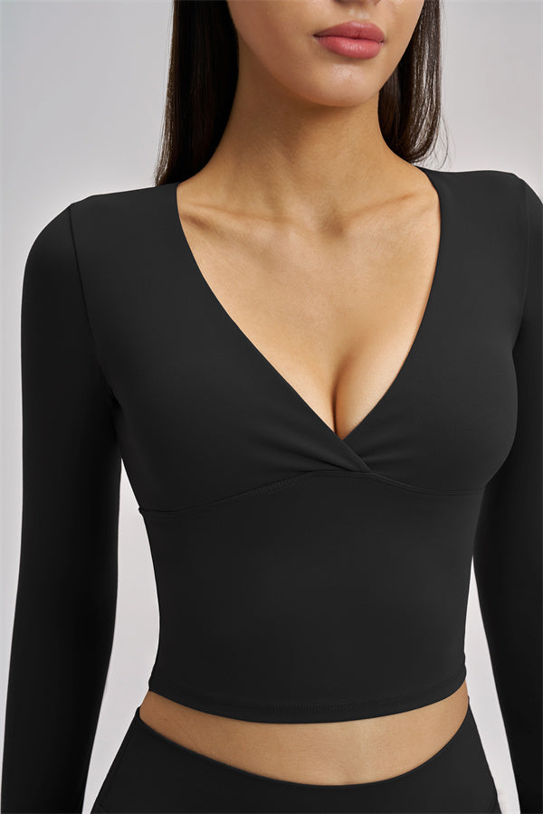 Fitglutes Activewear long sleeve crop top with fitted design, perfect for gym workouts and sports activities.