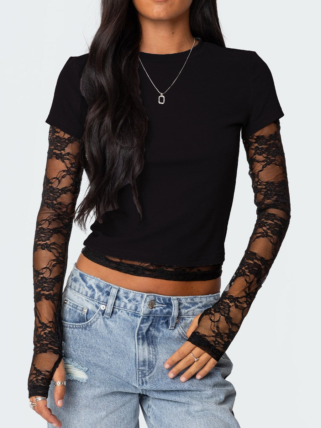 Women's elegant lace sleeve fitted T-shirt by Trendsi featuring sophisticated lace details and a casual, stylish fit.
