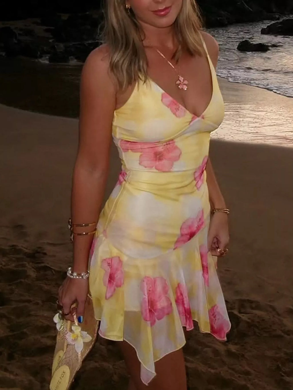 Sheer floral print sleeveless asymmetrical mini dress by Shopimist, featuring a lightweight fabric and stylish design.
