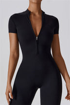 Fitglutes Activewear Mia Belle jumpsuit in black, form-fitting gymwear with sleeveless design and sporty style for workout sessions.
