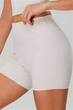 Fitglutes activewear one-shoulder crop top and matching shorts 2-piece set for workout and sportswear, shown in the image.