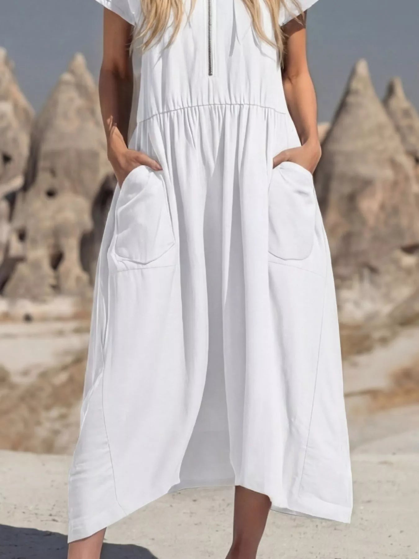 Plus size full zip hooded midi dress with pockets from Plush Fashion Hub, featuring a hood, zipper front, and side pockets.