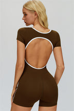 Fitglutes Activewear The Whisper Romper jumpsuit in sleek black, featuring a fitted workout design and breathable fabric.