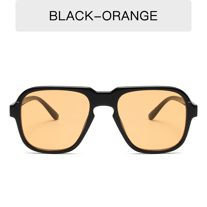 Vintage large rim sunglasses from Plush Fashion Hub with retro driving and fashion eye wear, featuring oversized dark lenses and stylish frames.