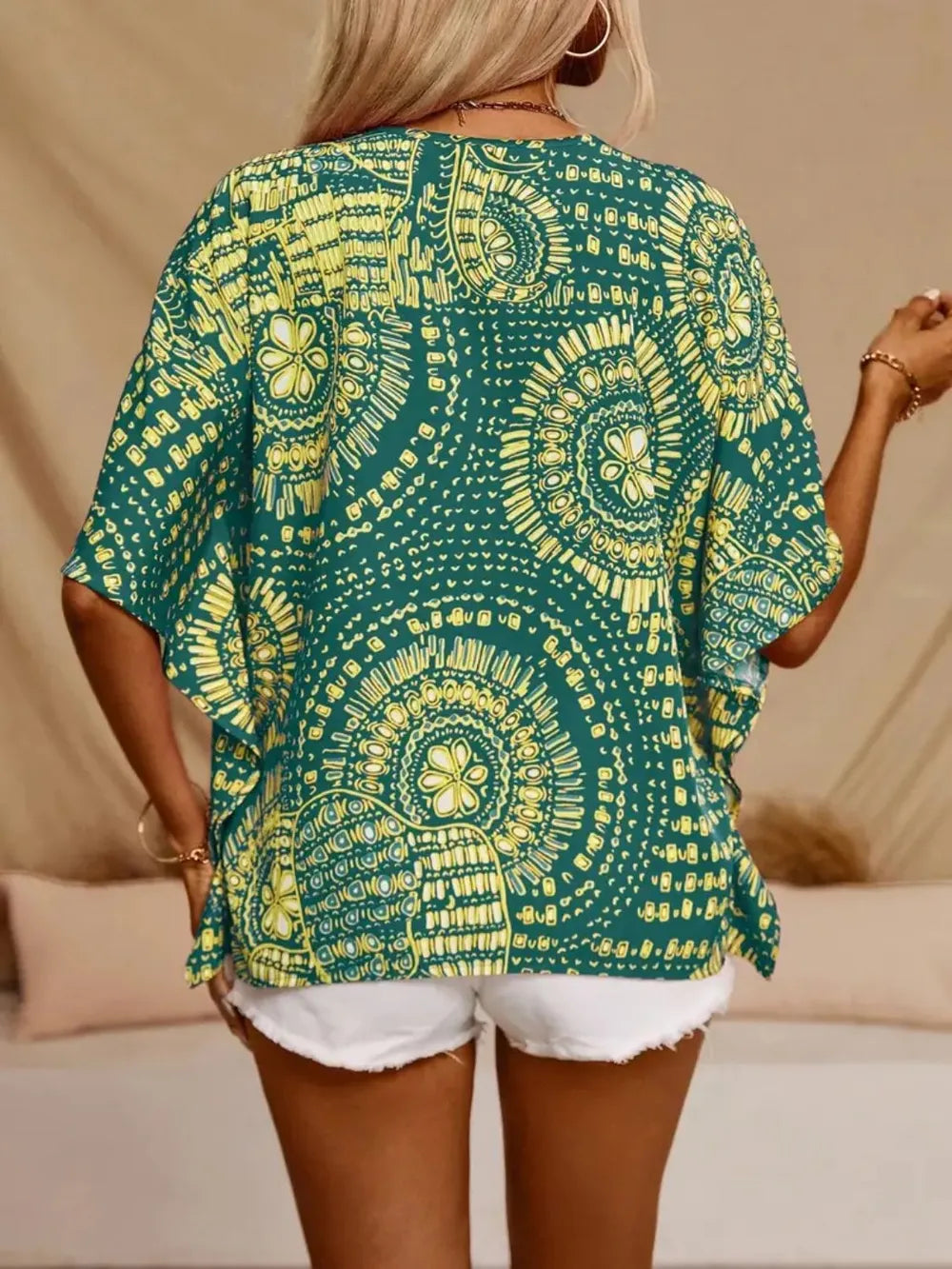 Women's printed V-neck half sleeve casual top by Plush Fashion Hub featuring a soft stretch fabric and stylish office blouse design.