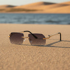 Gold frame cheetah rimless sunglasses with sleek design, stylish eye wear by Plush Fashion Hub in hip-hop fashion style.