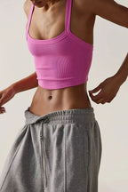 Scoop neck active tank from Trendsi, sleeveless athletic wear with a fitted silhouette, ideal for workouts and active lifestyles.