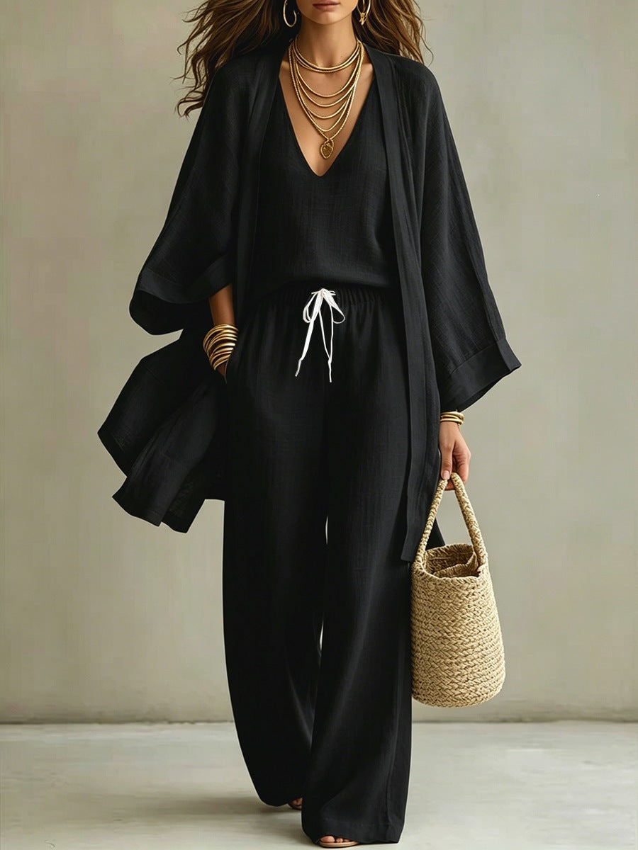 Women's 3-piece cardigan, sleeveless vest, and wide-leg pants matching set by Plush Fashion Hub, styled together in a coordinated outfit.