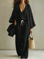 Women's 3-piece cardigan, sleeveless vest, and wide-leg pants matching set by Plush Fashion Hub, styled together in a coordinated outfit.