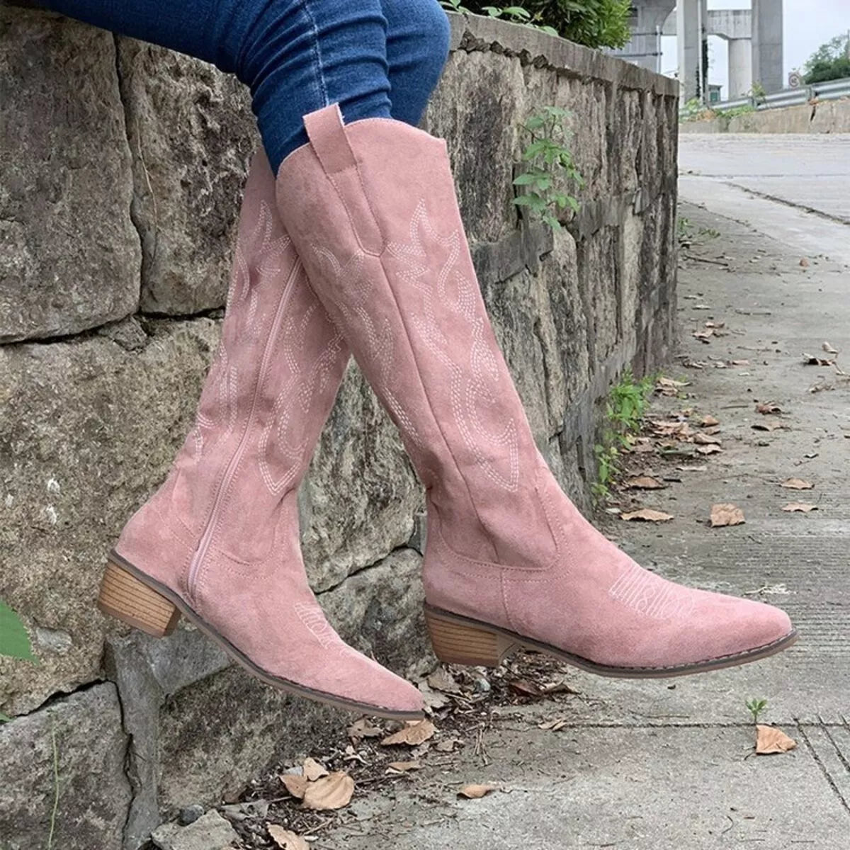 Point toe block heel boots by Trendsi featuring sleek black leather with a stylish pointed toe design and sturdy block heel.