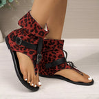 Leopard print toe post sandals by Shopimist with slim straps and flat sole, perfect for casual summer wear.
