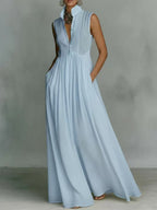 Women's French-style high-waist midi dress with ribbon tie, casualwear by Plush Fashion Hub, shown in a stylish, flowing design.