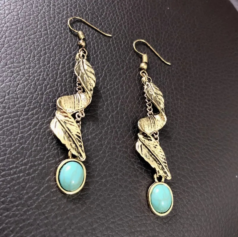 Elegant alloy leaf turquoise earrings from Shopimist with intricate leaf design and vibrant turquoise color, perfect for fashion accessories.