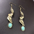 Elegant alloy leaf turquoise earrings from Shopimist with intricate leaf design and vibrant turquoise color, perfect for fashion accessories.