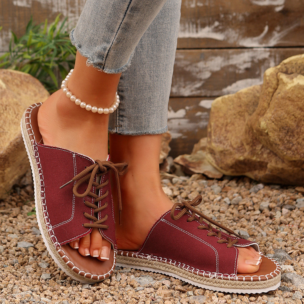 Women's lace-up open toe flat sandals in faux leather, stylish Trendsi shoe with comfortable design and trendy details.
