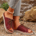 Women's lace-up open toe flat sandals in faux leather, stylish Trendsi shoe with comfortable design and trendy details.