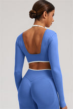 Fitglutes Activewear long sleeve crop top and leggings 2-piece set, designed for gym and workout, in stylish athletic fabric.