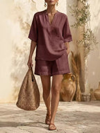 Plus size women's lounge dress with notched half sleeves and pockets, stylish and comfortable from Trendsi.