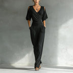 Women's V-neck slim fit straight leg jumpsuit by Plush Fashion Hub, shown in a stylish, fitted design with a V-neck neckline.