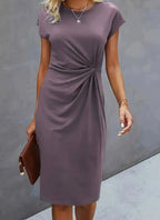 FitiqueFit front knot bodycon midi dress with round neck, sleeveless tie detail, form-fitting design, perfect for stylish occasions.