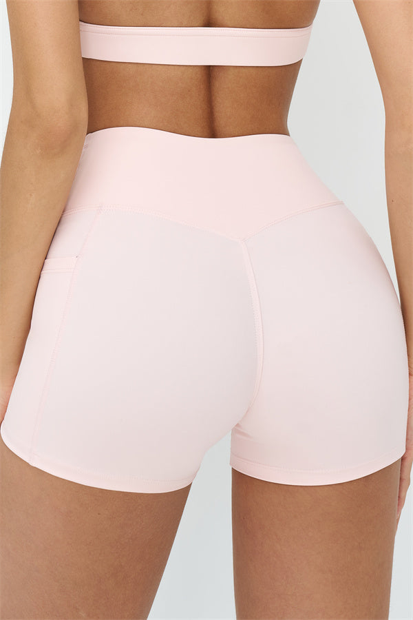 Fitglutes Activewear crop top and shorts 2-piece set, gym and workout sportswear, lightweight and breathable athletic clothing.