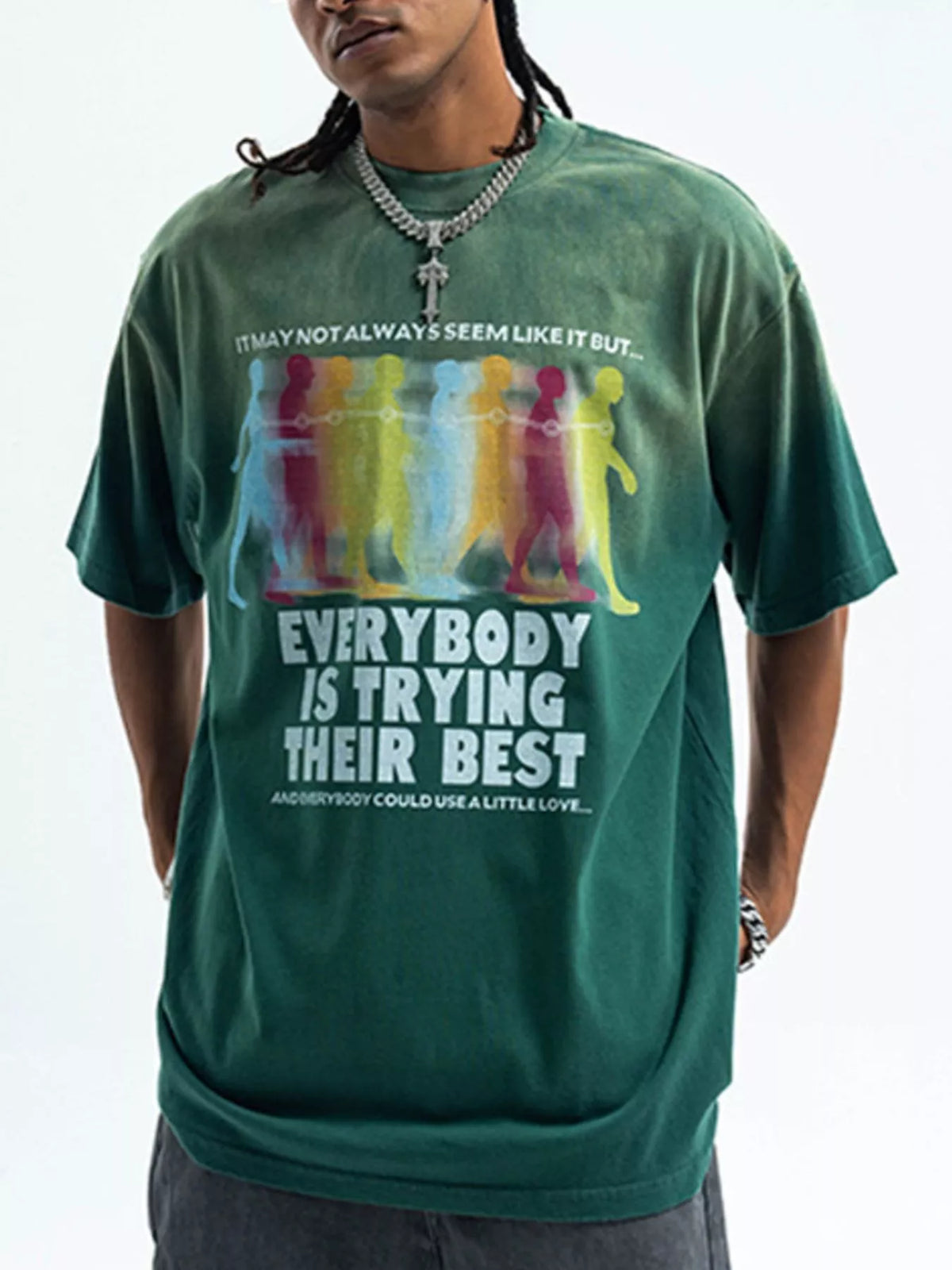 Men's graphic round neck short sleeve T-shirt from Trendsi with bold design on soft cotton fabric.