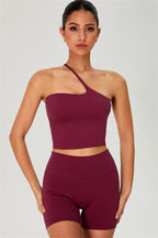 Fitglutes activewear one-shoulder crop top and matching shorts 2-piece gym set, designed for workout and sports activities