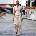 Women’s elegant sleeveless two-piece suit set by FitiqueFit, featuring a waist-cinching design and casualwear style.